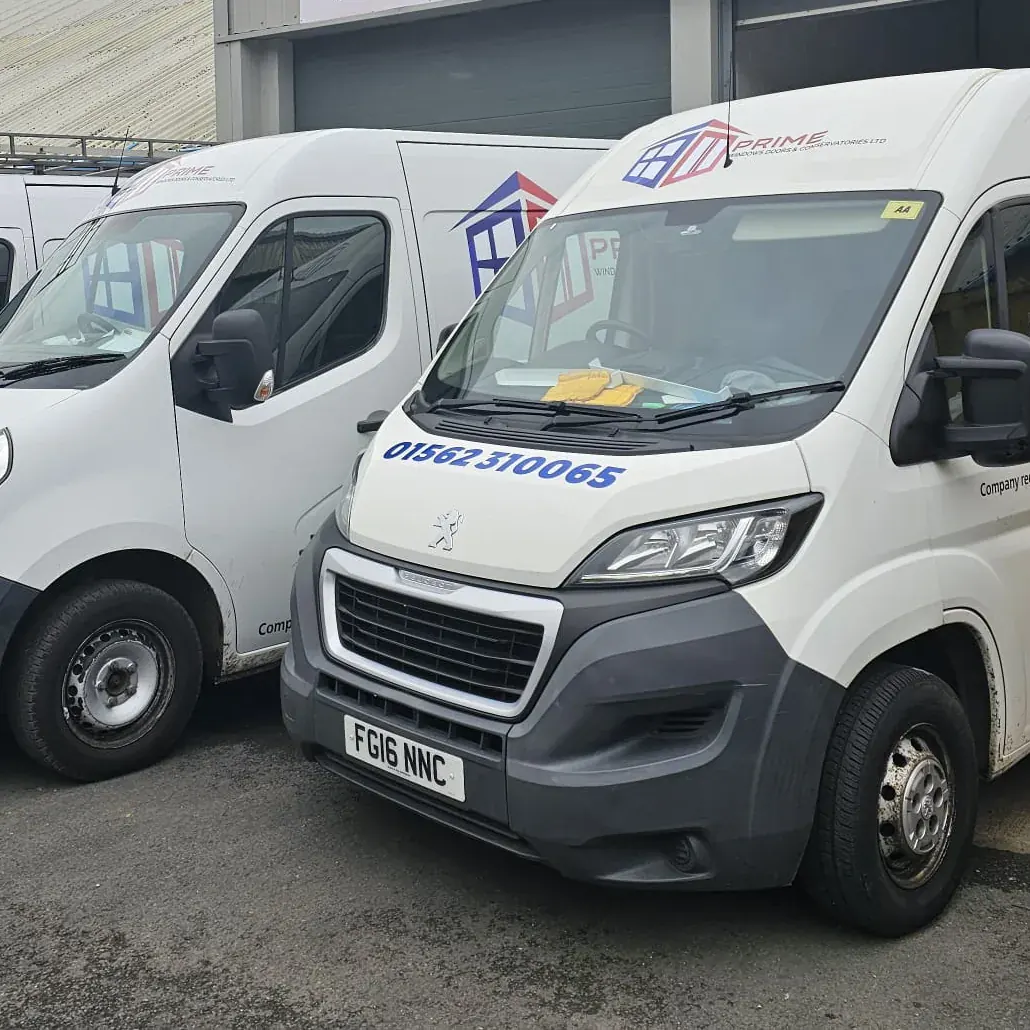 Prime Windows branded vans outside the company base in Stourport-on-Severn